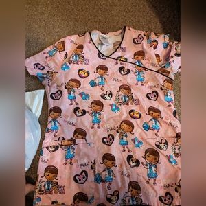 Scrubs sz S (4 tops & 1 pant)-2 Disney themed, 1-floral, 1 Halloween, and 1 pant